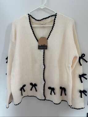 Main Strip Cream Cardigan with Black Bow Accents M